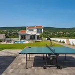 Anja Is A 4 Bedroom With A 32 Sqm Heated Pool Near Imotski